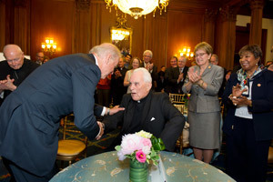 Vice President Joe Biden shakes hands with University President Emeritus Rev. Theodore M. Hesburgh, C.S.C.